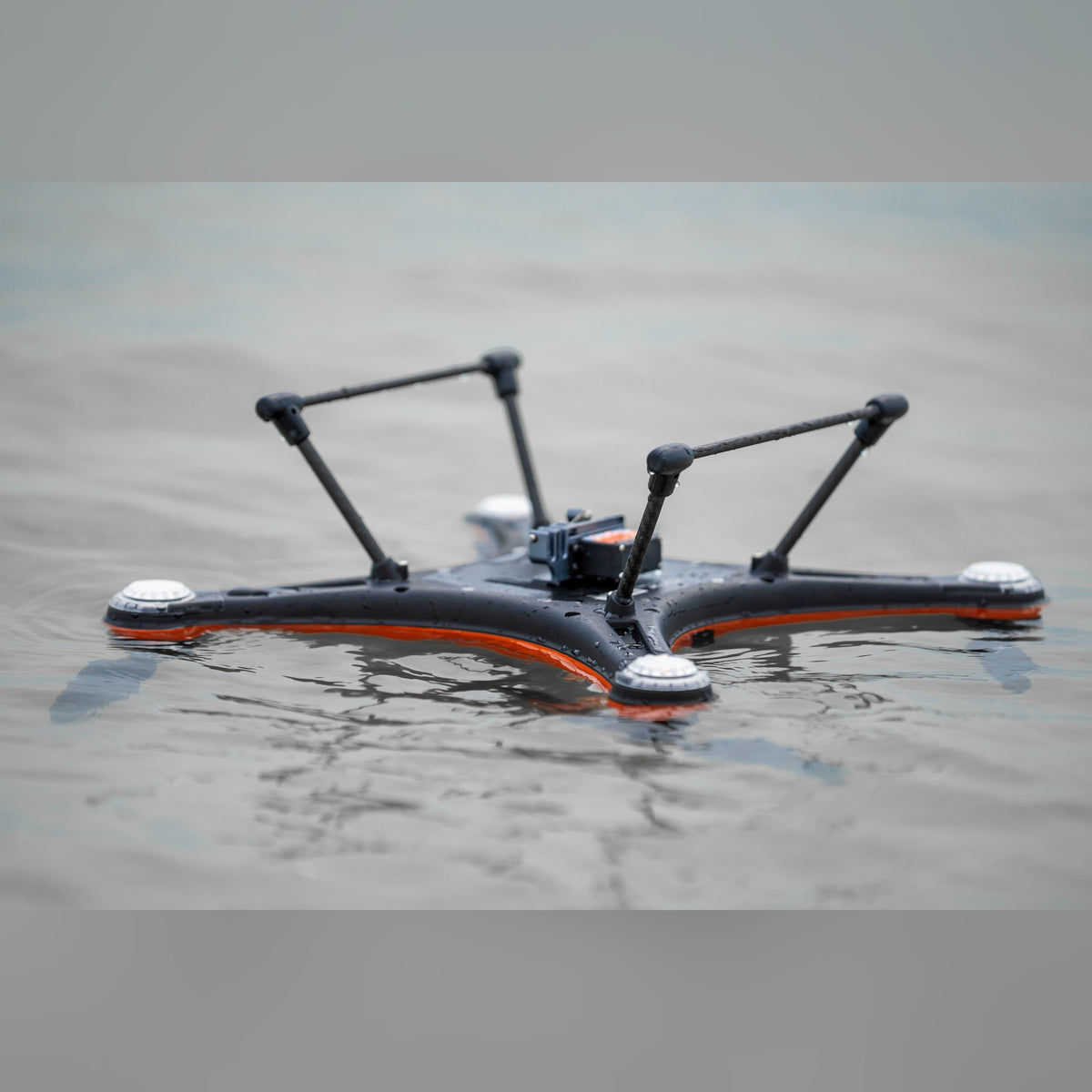 SwellPro Fisherman FD1+ floating on the water