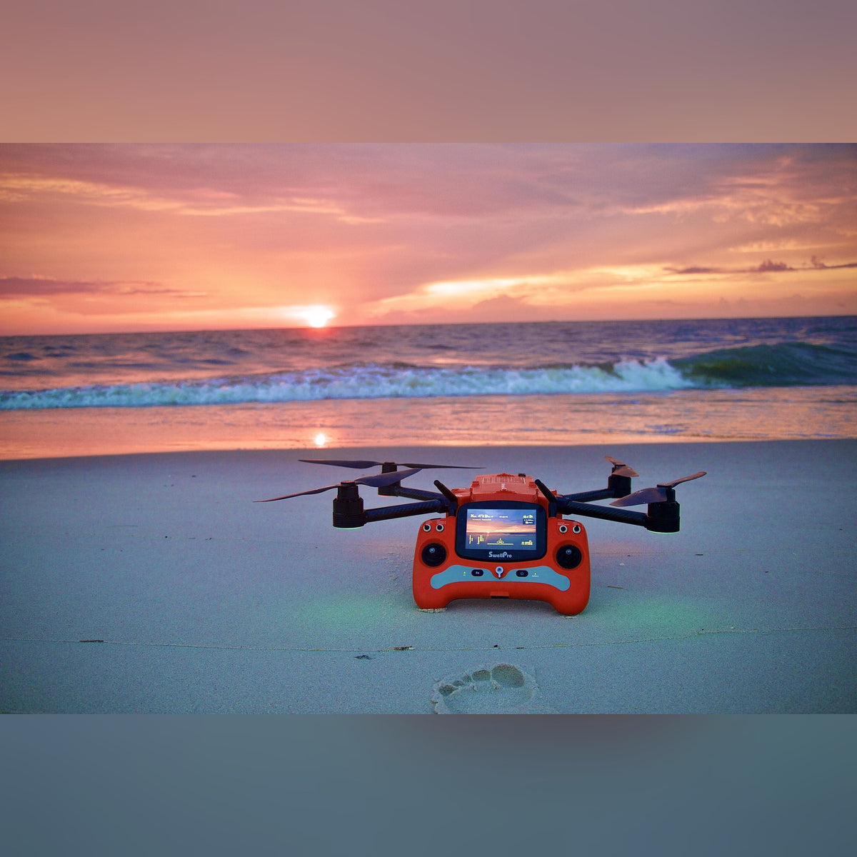 SwellPro Fisherman Max FD2 Advanced with controller at golden hour