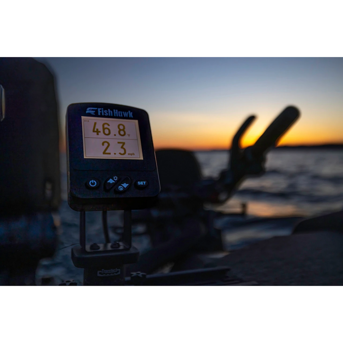 Fish Hawk ONE display mounted on a boat in low light